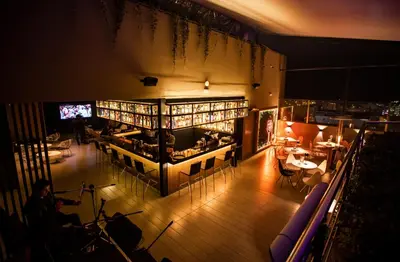 an overhead view of a restaurant with tables and chairs at Wyndham Costa del Sol Lima City in Lima