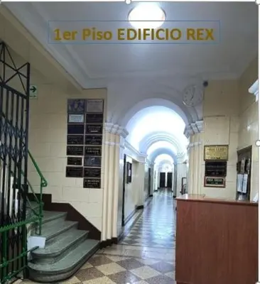 a hallway with a staircase in a building at ESTUDIO COMPLETO en el CENTRO HISTORICO de LIMA in Lima