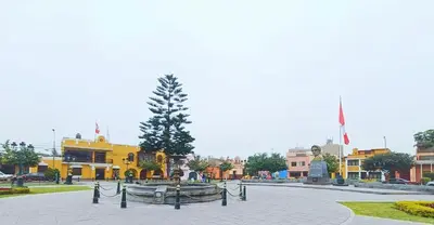 a street in a town with a boat on the street at Casa Turística Monumental in Lima