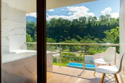 a view from the balcony of a house at Villa San Ramon - BIG HOUSE - Chamchamayo in San Ramón
