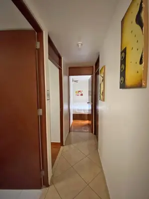 a hallway leading to a room with a bedroom at Cerca a las universidades San Marcos y Católica in Lima