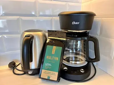 a coffee maker and a coffeemaker on a counter at Aldea 3 Bedroom Terrace Escape with Service Room in Paracas