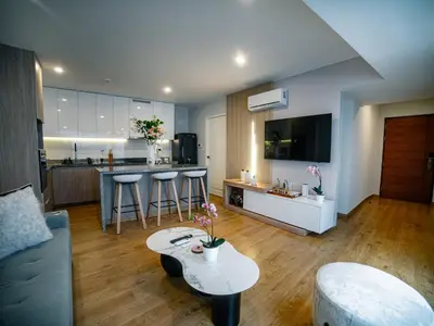 a living room with a couch and a table at Beautiful and Well Located in Lima