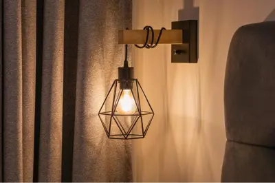 a lantern light hanging from a wall with curtains at Private room by the sea Miraflores in Lima