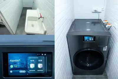 a washing machine in a bathroom next to a sink at Modern Duplex by the sea Miraflores in Lima