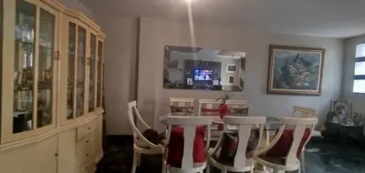 a dining room with a table and some chairs at Habitación H3, TV y WIFI cerca a Barranco in Lima