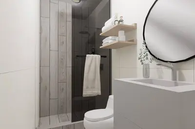 a bathroom with a toilet and a sink and a mirror at Suite Romántica Vista al Mar Cerca al Aeropuerto y Miraflores in Lima