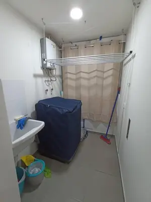 a small bathroom with a toilet and a sink at Departamento en estreno Alameda Central in Lima