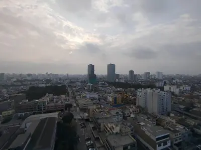 a view of a city with tall buildings at Habitación con baño compartido Santa Catalina in Lima