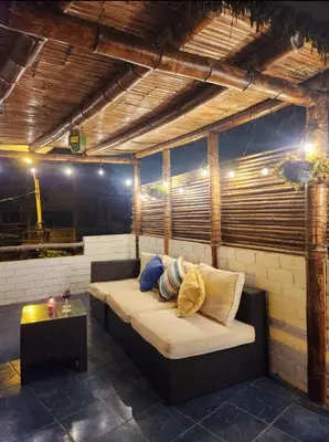 a living room with a couch and a table at 