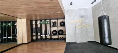 a room with a bunch of wine bottles on a wall at Apartamento en Miraflores in Lima