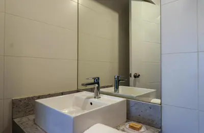 a bathroom with a sink and a mirror at Stelar by Wynwood House in Lima