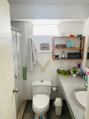 a bathroom with a toilet and a sink at Alojamiento frente al mar en San Bartolo in San Bartolo