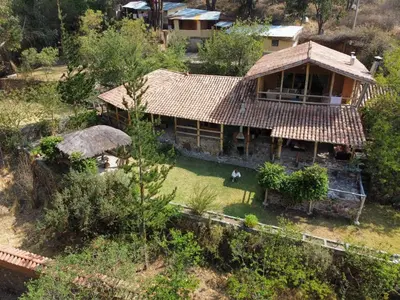 an aerial view of a house with a roof at SAMAY WASI Rest house in Ollantaytambo