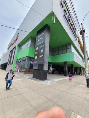 a man standing in front of a building at Departamento Centenario in Lima