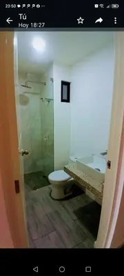 a bathroom with a tub and a toilet and a shower at Depa en Punta Hermosa in Punta Hermosa
