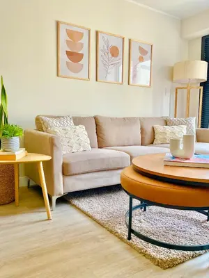 a living room with a couch and a table at Lima Limón in Lima