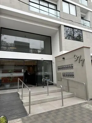 a building with a staircase in front of it at Modern 2Br Apt Fully Furnished Barranco in Lima