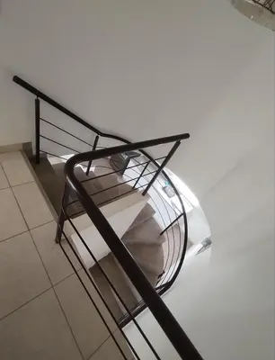 a glass object sitting on top of a floor at Duplex con piscina en Asia in Asia