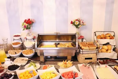 a buffet with various types of food on a table at Quinta San Blas by Ananay Hotels in Cusco