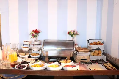 a buffet with many different types of food on a table at Quinta San Blas by Ananay Hotels in Cusco
