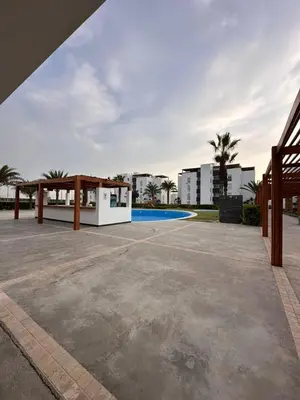 a patio with a pavilion and a swimming pool at Mirador 101 in Asia