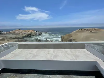 a view of the ocean from the roof of a house at Casa de playa con vista al mar y piscina in Cerro Azul