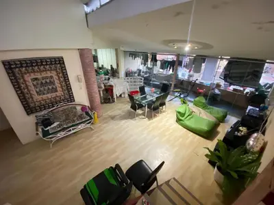 an overhead view of a living room with green furniture at Habitación con baño particular, lindas áreas comunes in Lima