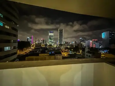 a view of a city skyline at night at Moderno Dpto , Equipado, Céntrico, Vista Increible in Lima