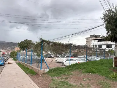 a bunch of cars parked in a parking lot at Adela's Home in Cusco