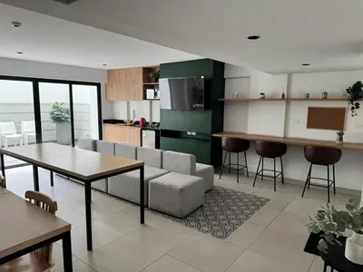 a living room with a couch and a table at Exclusive apartment Barranco! in Lima