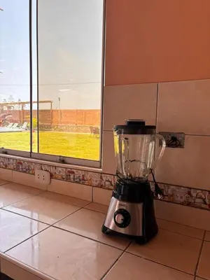 a blender sitting on a counter next to a window at Casa Puente Azul - Casa de Playa in Cerro Azul