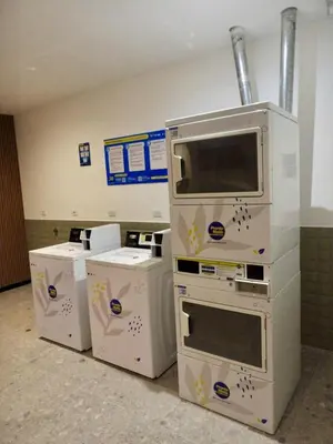 a group of appliances stacked up in a room at INTI Studio Apartment in Lima