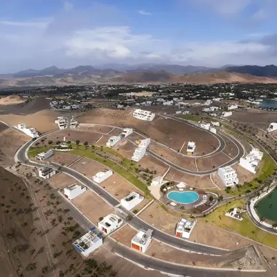 an aerial view of a town in the desert at Bujama beach Home Family Asia in Mala