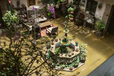 an overhead view of a garden in a room with plants at La Casona Real Cusco in Cusco