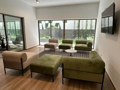 a living room with a couch and chairs and a table at No available in Lima