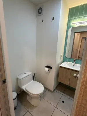 a bathroom with a toilet and a sink at No available in Lima
