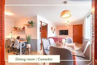 a living room with a dining room i contender at Vibrant Exclusive 1BR Apt in front of Casa Andina in Lima