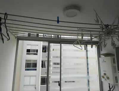 a window in a room with a large glass door at Alquilo Departamento en Comas in Lima