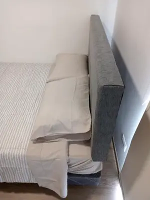 a bed in a room with at Rosita del Mar in San Bartolo
