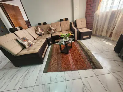 a living room with a couch and a coffee table at Casa Mirador SanBlas Quilla in Cusco