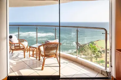 a balcony with a view of the ocean at M1001 - Malecon Seaview 2BDR Miraflores in Lima