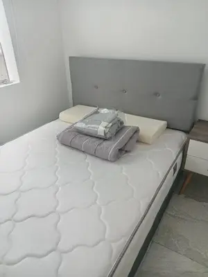 a white mattress sitting on a bed in a room at Excellent view of Mar San Bartolo in San Bartolo