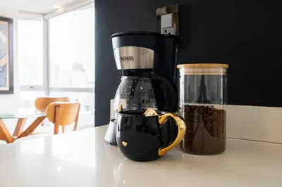 a coffee maker sitting on top of a counter at Balta - Apartment with Panoramic View in Kennedy Park in Lima