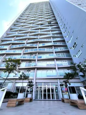 a tall building with trees in front of it at Departamento en Santa Catalina cerca a San Isidro in Lima