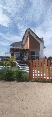 a house with a fence in front of it at Zen Home & Relax - Chincha in Chincha Baja