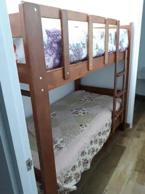 a couple of bunk beds in a room at Apartment Rosi Beach & Pool Punta Hermosa in Punta Hermosa