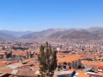 a view of a city with mountains in the background at Jerusalen Inn-Dep 4 in Cusco