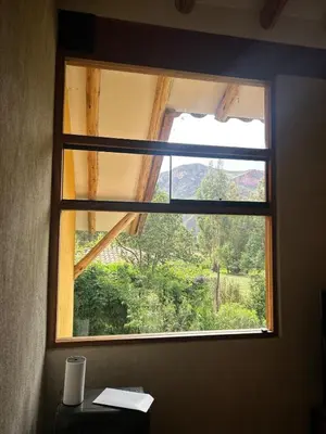 a window in a room with a view at Luxury house in Urubamba, Cusco, Perú in Urubamba