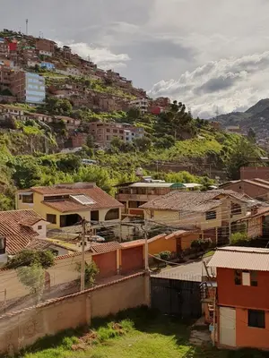 a view of a city with houses on a hill at Your 2nd home in residential area in Cusco